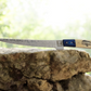 Something's Fishy Branded 
14" Stainless steel Damascus Fillet knife twist pattern 256 layers with full tang, etched Mahi Fish on Bone handle with blue wood finish.